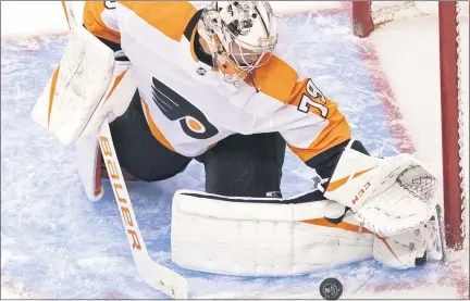  ?? FRANK GUNN — FOR THE CANADIAN PRESS ?? Flyers goaltender Carter Hart makes a save against the Tampa Bay Lightning during the second period of a Eastern Conference “seeding tourney” title game Saturday at Scotiabank Arena in Toronto.