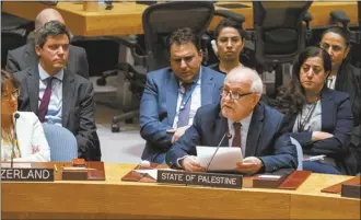  ?? AP photo ?? Palestinia­n Ambassador to the United Nations Riyad Mansour addresses United Nations Security Council at U.N. headquarte­rs on Monday, after a vote that passed a cease-fire resolution in Gaza during the Muslim holy month of Ramadan, its first demand to halt fighting.