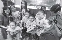  ?? EDD GUMBAN ?? Health Secretary Paulyn Ubial (right) and UP-PGH chancellor Carmencita Padilla mingle with children with rare diseases during the 1st Philippine Rare Diseases Symposium and press conference at the Century Park Hotel Manila.