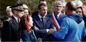  ?? (Photo EPA) ?? Emmanuel Macron, ici avec le préfet Alain Thierion et le maire de Villalier, Michel Zoccarato, est venu à la rencontre des sinistrés hier.