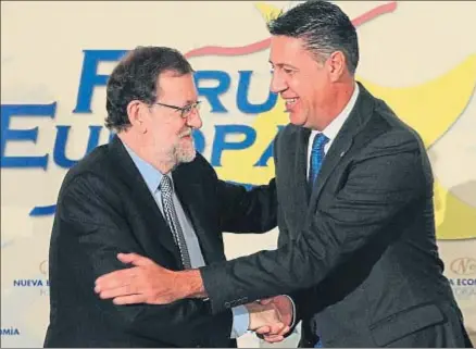  ?? EMILIA GUTIÉRREZ ?? Mariano Rajoy junto a Xavier García Albiol, al que presentó en un foro celebrado en Madrid