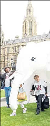  ??  ?? Members of STOP HS2 take their protests to Parliament