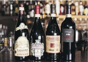  ??  ?? A selection of Amarone wines at the Almanac restaurant on Whyte Avenue.