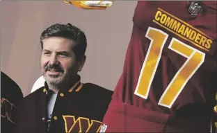  ?? PATRICK SEMANSKY/AP ?? WASHINGTON COMMANDERS OWNER DAN SNYDER poses for photos during an event to unveil the NFL football team’s new identity on Feb. 2, 2022 in Landover, Md.