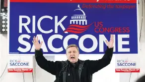  ?? ANTONELLA CRESCIMBEN­I / PITTSBURGH POST-GAZETTE VIA THE ASSOCIATED PRESS ?? Rick Saccone, Republican candidate for the 18th Congressio­nal District, speaks during a campaign rally with Greene County coal miners on Monday in Waynesburg, Pa.
