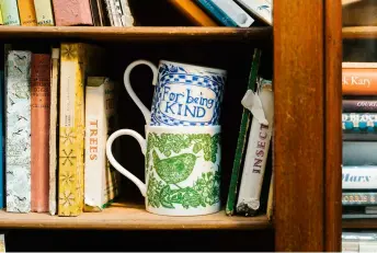  ??  ?? Below: These ceramic mugs are made for Lou in Stokeon-trent, and screen printed by a family-run company in nearby Gwithian