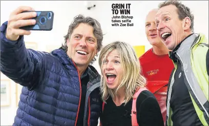  ??  ?? GRIN IT TO WIN John Bishop takes selfie with Zoe Ball