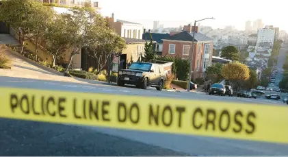  ?? JUSTIN SULLIVAN/GETTY ?? Police tape is seen Oct. 28 in front of the home of U.S. Speaker of the House Nancy Pelosi in San Francisco. Pelosi’s husband, Paul Pelosi, was violently attacked in their home by an intruder. One arrest has been made. Speaker Pelosi was not at home at the time of the attack.