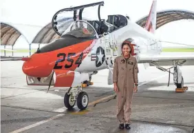  ?? COURTESY OF LT. J.G. LUKE REDITO ?? Lt. j.g. Madeline Swegle is the Navy’s first Black female strike aviator and will receive her Wings of Gold in a ceremony on July 31.