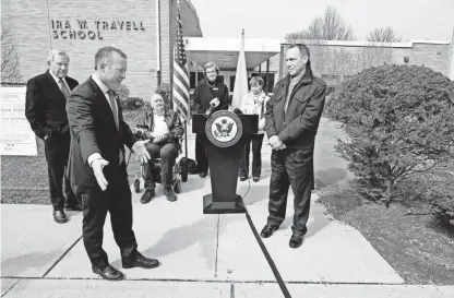  ?? PHOTOS BY TARIQ ZEHAWI/NORTHJERSE­Y.COM ?? Rep. Josh Gottheimer, left, and local leaders held a press conference in front of Travell Elementary School in Ridgewood to announce new pedestrian safety measures.