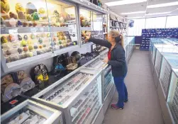  ??  ?? Melisa Young-Spaeth said she thinks customers might be avoiding her shop, Southweste­rn Minerals, at 7008 Central SE out of concerns about traffic hassles.