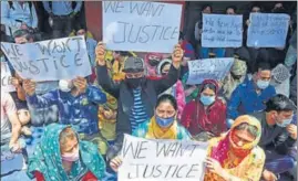  ?? ANI PHOTO ?? Kashmiri Pandits stage a protest in Srinagar on Saturday.