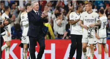  ?? File ?? ↑
Real Madrid coach Carlo Ancelotti (left) and Toni Kroos celebrate after their Champions League semi-final second leg against Bayern Munich.