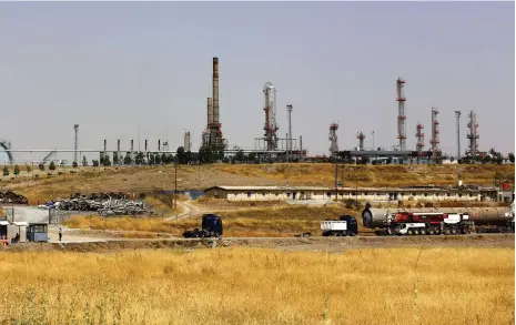  ?? AFP ?? A refinery near Erbil. An arbitratio­n ruling last week declared the Iraqi Kurdistan region’s oil exports through Turkey were illegal