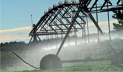  ??  ?? Irrigators are working flat-out on farms after a month with out rain.