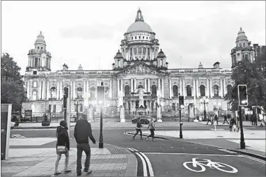  ?? RICK STEVES/RICK STEVES’ EUROPE ?? Belfast’s City Hall is a polished and majestic celebratio­n of Victorian-era pride built with industrial wealth.