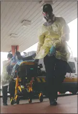  ??  ?? A man arrives at Starr County Memorial Hospital in Rio Grande City, Texas.