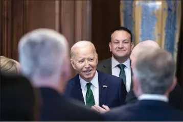  ?? HAIYUN JIANG — THE NEW YORK TIMES ?? President Joe Biden attends the Friends of Ireland luncheon hosted by House Speaker Mike Johnson, R-La., on Capitol Hill in Washington, D.C. on Friday.