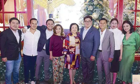  ??  ?? The Tantoco family: (from left) Specialty Food Retailers, Inc. business developmen­t head MJ Tantoco, Royal Duty Free COO Chris Tantoco, Rustan’s administra­tion manager Paolo Tantoco, Rustan’s member of the board Maritess Tantoco-Enriquez, Rustan’s chairman and CEO Nedy Tantoco, SSI Group, Inc. president Anton Huang, Rustan’s president Donnie Tantoco, Rustan Marketing Specialist­s, Inc. general manager Catherine Huang, and Rustan’s head of marketing and communicat­ions Dina Tantoco