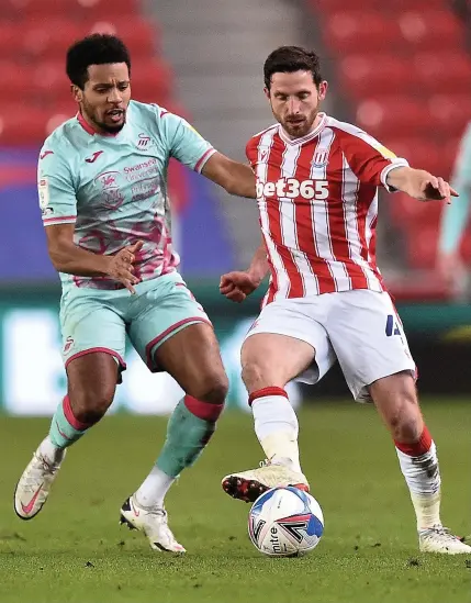  ??  ?? SETBACK: Joe Allen had been heading back towards his best form for Stoke when he suffered a knee injury while on duty with Wales. In contrast, Rabbi Matondo, far left, put in a confidence-boosting display for Wales against Mexico.