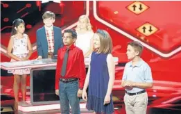  ?? EVANS VESTAL WARD/NBC ?? Sebastian Veras, front in glasses, and Ashley Headrick, behind him, both of Baldwin Park in Orlando, compete in the premiere of “Genius Junior” on NBC.