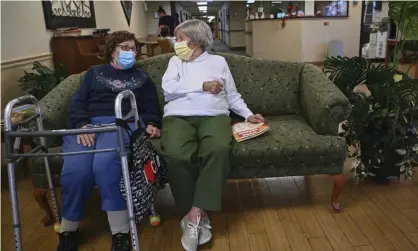  ??  ?? Carmela Sileo, left, and Susan McEachern at the Arbor Springs nursing home in Opelika, Alabama, in February. Photograph: Julie Bennett/AP