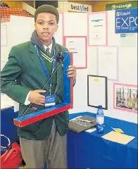  ??  ?? BUDDING SCIENTIST: Paterson High School Grade 10 pupil Mandilakhe Gqolana, 16, with his Pythagoras device