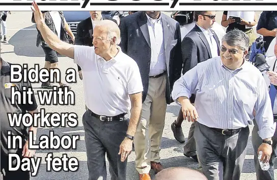  ??  ?? SAME WAVELENGTH: Vice President Joe Biden (left) marches with AFL-CIO chief Richard Trumka in Pittsburgh’s Labor Day parade on Monday.