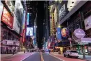  ??  ?? An empty Times Square is seen on the street following the outbreak of coronaviru­s disease in New York City. Photograph: Jeenah Moon/Reuters