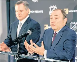  ?? AP PHOTO ?? National Hockey League commission­er Gary Bettman, right, speaks while James Murren, CEO of MGM Resorts Internatio­nal, listens during a news conference in New York, Monday.