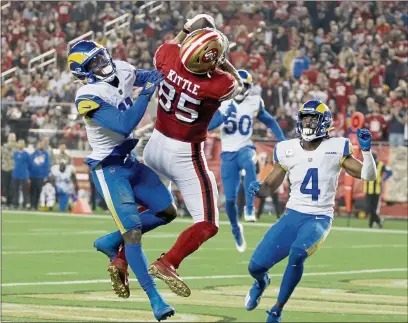  ?? JANE TYSKA — BAY AREA NEWS GROUP ?? The 49ers’ George Kittle makes a touchdown catch against the Los Angeles Rams in Santa Clara on Nov. 15.