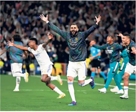  ?? AFP ?? Star of the night: Real Madrid's French forward Karim Benzema celebrates at the end of the UEFA Champions League semifinal second leg football match between Real Madrid and Manchester City at the Santiago Bernabeu stadium in Madrid.