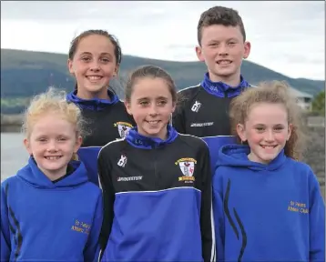  ??  ?? St Peter’s AC members Niamh Allen, Niamh Brady, Lucy Smyth, Sean Allen and Dearbhla Allen at the road races held in Carlingfor­d.