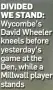  ??  ?? DIVIDED WE STAND: Wycombe’s David Wheeler kneels before yesterday’s game at the Den, while a Millwall player stands