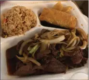  ?? (Arkansas Democrat-Gazette/Eric E. Harrison) ?? The Mongolian Beef lunch special was a last-minute substitute for the House Tofu after Mr. Hui’s kitchen ran out of tofu.