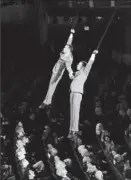  ?? By Robert Deutsch, USA TODAY ?? Cirque du Soleil in the house: Performers dressed as Cary Grant from North by Northwest take flight over the Hollywood & Highland Center audience.