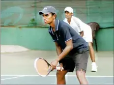  ??  ?? The champion men's doubles pair Dineshkant­han and Jayawickra­ma.