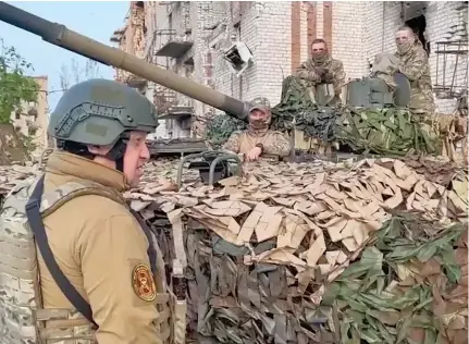  ?? Photo: BBC ?? Yevgeny Prigozhin speaks to Wagner soldiers in Bakhmut.