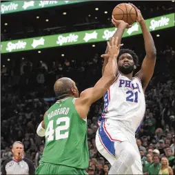  ?? STEVEN SENNE/ASSOCIATED PRESS ?? When the 76ers truly needed Joel Embiid (right) to play like an MVP, he scored just 15 points in Game 7 against Boston in a landmark defeat that thrust the franchise into its most pivotal offseason since 2013, when it launched the decadelong program toward a championsh­ip.