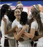  ?? MORRY GASH — THE ASSOCIATED PRESS ?? Stanford players celebrate at the end of a women’s Final Four semifinal game against South Carolina on Friday at the Alamodome in San Antonio. Stanford won 66-65.