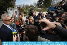  ?? ?? SENEC, Slovakia: Photograph­ers watch Slovakia’s Former minister of Foreign affairs and presPKLU[PHS JHUKPKH[L 0]HU 2VYJVR SLM[ [HSRPUN [V QV\YUHSPZ[Z HM[LY ]V[PUN K\YPUN [OL ÄYZ[ YV\UK VM Slovak presidenti­al elections on March 23, 2024 in Senec, Slovakia. — AFP