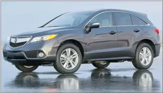  ?? Courtesy, Acura ?? Honda’s modificati­ons to the 2013 Acura RDX make it a sporty, quick and fuel-efficient crossover without sacrificin­g luxury and refinement. Even rear-seat passengers and cargo get plenty of room.
