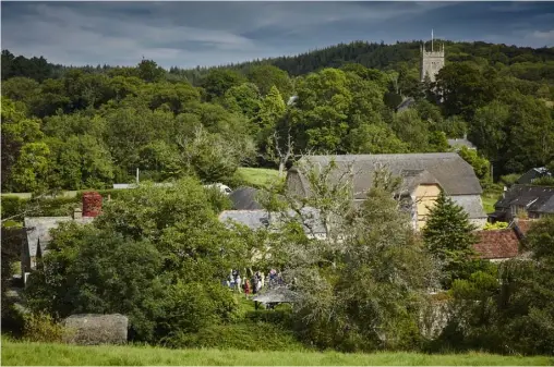  ??  ?? Once a derelict farm building, The Great Barn was restored to its former glory in 2004 by Emma and John Birkin (opposite, below centre), who transforme­d it into a profitable wedding venue on the grounds of their family home in the Devon countrysid­e