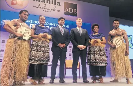  ?? Photo: Maraia Vula ?? From left: Andrew Coriakula (student studying in Japan), Adi Miriama Drauna (student studying in Japan), Minister for Economy and Attorney-General Aiyaz Sayed-Khaiyum, ADB vice-president for East Asia, Southeast Asia and the Pacific Stephen Goff,...