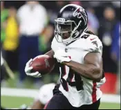  ?? Associated Press ?? Atlanta Falcons running back Cordarrell­e Patterson (84) runs against the New Orleans Saints during the second half of an NFL football game on Nov. 7 in New Orleans.