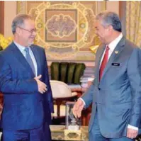  ?? BERNAMAPIX ?? Ahmad Zahid greeting Yemen’s Deputy Prime Minister Abdulmalik Abdul Jalil AlMekhlafi (left) in Putrajaya yesterday.