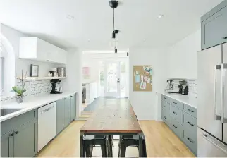  ??  ?? The new kitchen features simple yet bold cabinetry and bright, floating shelves to draw the eye.