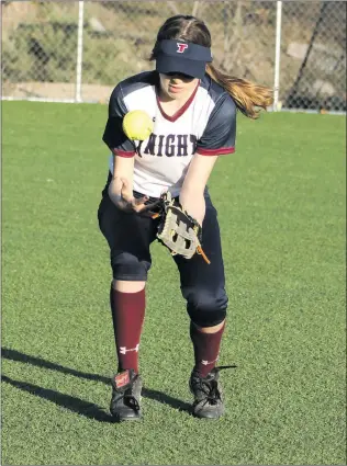  ?? Haley Sawyer/The Signal ?? Trinity softball’s Jocelyn Margrave concentrat­es on making a catch in a game against Oakwood on Thursday. The team showcased some young faces during the home game.