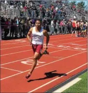  ?? KEV HUNTER — DIGITAL FIRST MEDIA ?? Abington’s Cameron Mitchell runs the anchor leg of the Ghosts’ first-place 4x800 relay team at the Jim Kelly Invitation­l at Hatboro-Horsham Saturday.