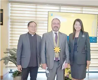  ?? PHOTOGRAPH­S COURTESY OF THE UNIVERSITY OF SANTO TOMAS ?? (FROM left) UST Secretary-General Rev. Fr. Louie R. Coronel, O.P., EU Ambassador to the Philippine­s Luc Véron, and UST Office of Public Affairs director Assistant Professor Joreen T. Rocamora.